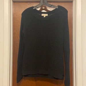 Nicki Minaj black knit sweater